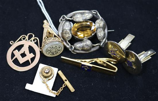A Victorian silver and citrine oval acorn brooch, a 9ct gold masonic pendant and seal and four other gilt metal masonic items.